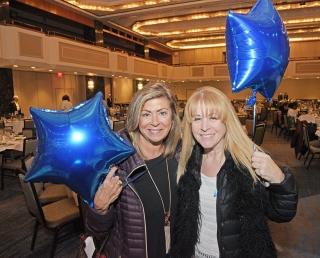Joan Franzese (left) and Hadassah Rosenman show off the balloons they received a