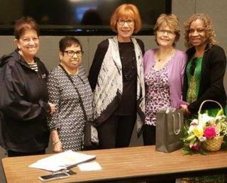 At the end of the ceremony, Retiree Programs Director Gerri Herskowitz (center),