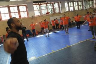 Stevenson leads the group in warmup exercises.