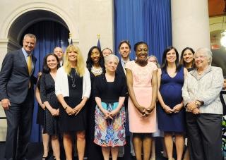 Mayor Bill de Blasio (left), UFT President Michael Mulgrew (back row, left) and 