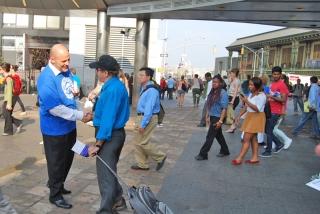 Michael Mulgrew and fellow UFT members gave out literature to commuters
