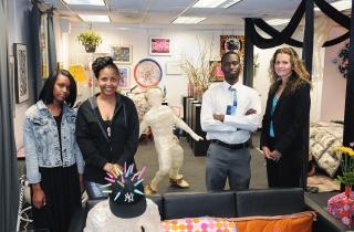 Art teacher and "project manager" Susan Tuthill (standing, far right) with some 