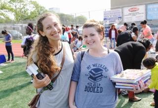Teachers Jaclyn Warner (left) of PS 255 and Samantha Bert of PS/MS 164 tote some