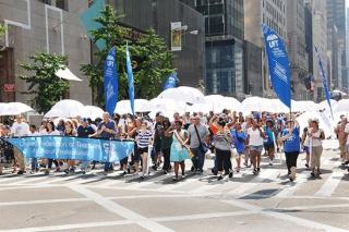 The UFT contingent marches up Fifth Avenue.