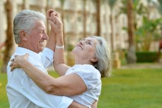 Happy mature couple dancing (generic)