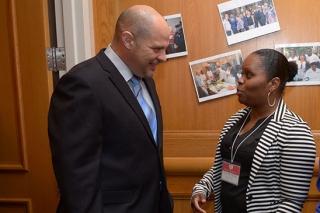 UFT President Michael Mulgrew listens to Roseno Brown of the Visiting Nurse Serv