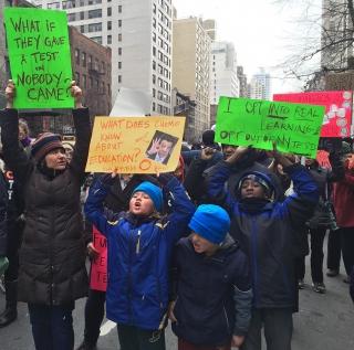 Parents and students show their resolve against high-stakes testing during the M