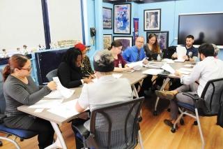 A Response to intervention team meeting, where staff share information about a c