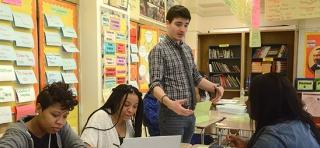 First-year history teacher Michael Liegey (standing) says: “I know I have my own