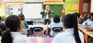Teacher Bonnie Petrone, with her 6th-grade class at PS/MS 105 in Far Rockaway