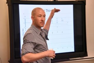 Tim Evans, a social studies teacher at Brooklyn HS for the Arts, presents his ac