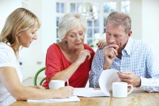 Retired couple with financial advisor