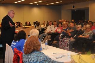 clockwise from top right: Florence Rosenwein emphasizes a point.