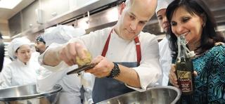 Chef Jonathan Benno of Lincoln Ristorante shaves the truffle onto freshly cooked