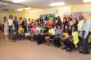 Award recipients gather for a photo.