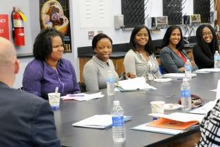 Teacher leaders from Brighter Choice Community School and Principal Fabayo McInt