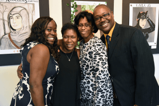 UFT District Representative Zina Burton-Myrick (left) and Clark congratulate Flu