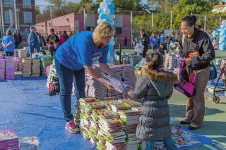 Susan Pulice, the chapter leader at PS 56 on Staten Island, helps a child and a 