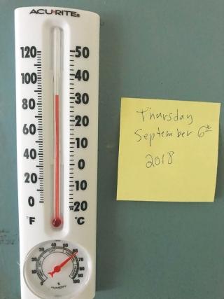 Thermometer with a post it note and a date, Sept 8, 2018