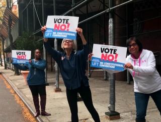 Long Island City HS secretaries hit the pavement.