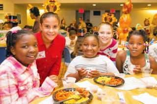 Middle school volunteers check in on a few of the special guests.