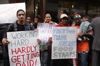Dozens of fast-food workers gathered outside a lower Manhattan Burger King.