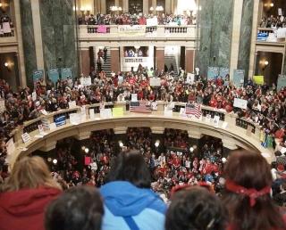 Thousands of angry public employees descended on the Wisconsin state Capitol in 