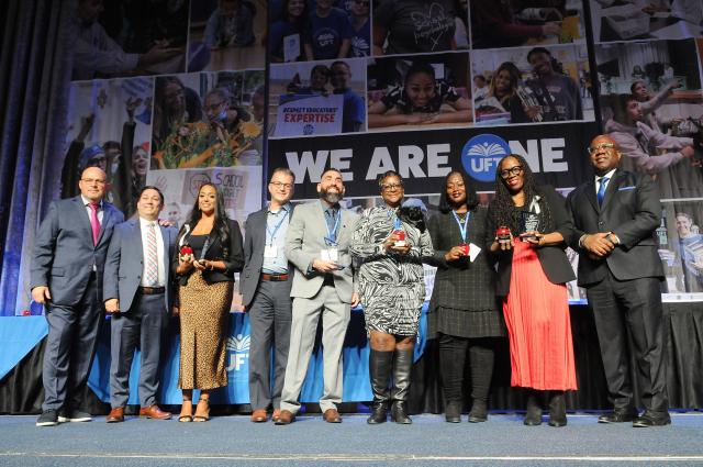 Audrey Chasen Award winners take the stage for a group photo at Teacher Union Day on Nov. 3, 2024 at the Midtown Hilton. 