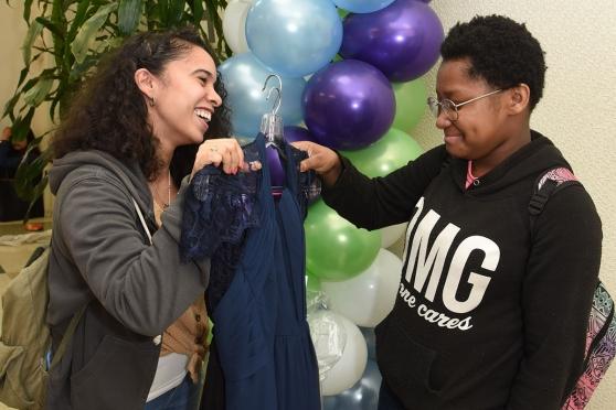 Katelyn Maldonado (left), a teacher at IS 217 in the Bronx, is impressed by her 