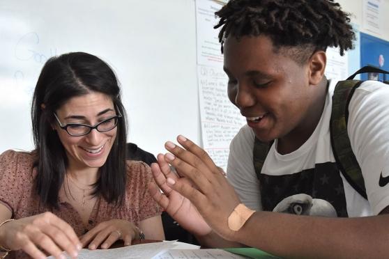 Leslie Lehrman, a master teacher at Fordham Leadership Academy, works with stude