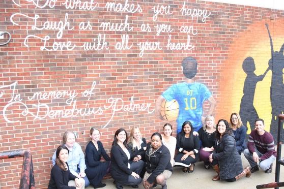 PS 82 educators, along with UFT District 28 Representative Angela Artis (sixth f