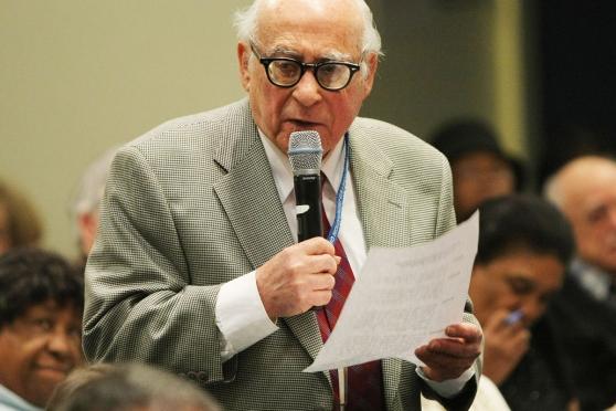 Abe Levine discusses a resolution at a Retired Teachers Chapter general membersh