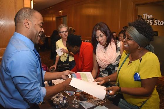 John Green, a legislative representative from NYSUT, speaks with Charlesetta O’N