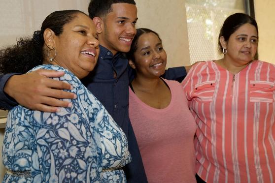 Award winner Louis Morel of Bronx Aerospace HS shares his happiness with (from l