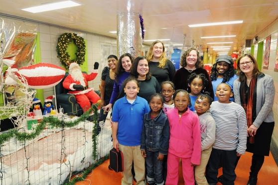 PS 335 1st-graders are led to their event .