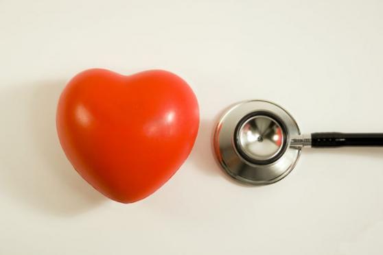 Plastic heart and stethoscope