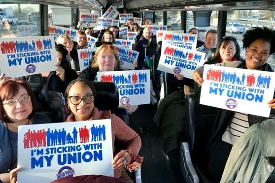 Members and parents on the Staten Island bus headed for Albany are ready and eag