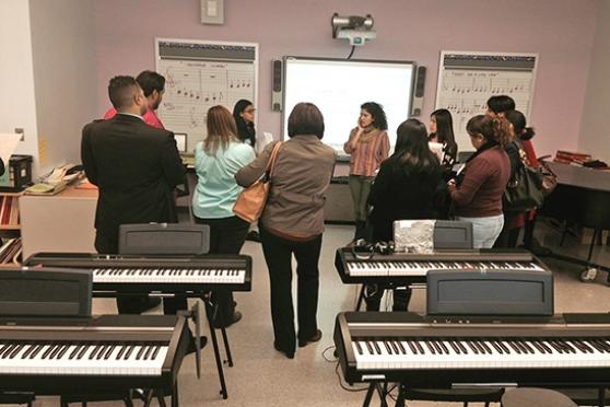 Invited educators, politicians and community leaders on Nov. 20 visited the musi