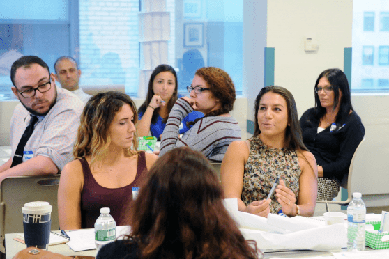 Jessica Esteves, a new teacher at PS 160 in the Bronx, asks a question at a work