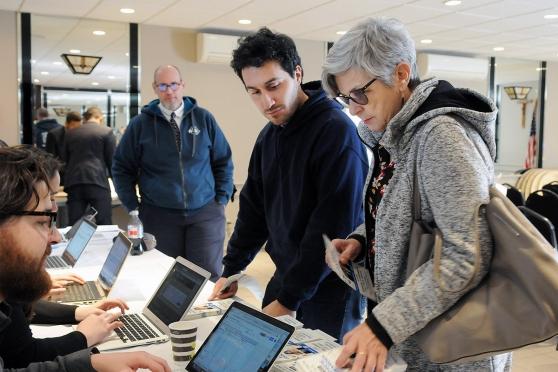 Man and woman standing at table