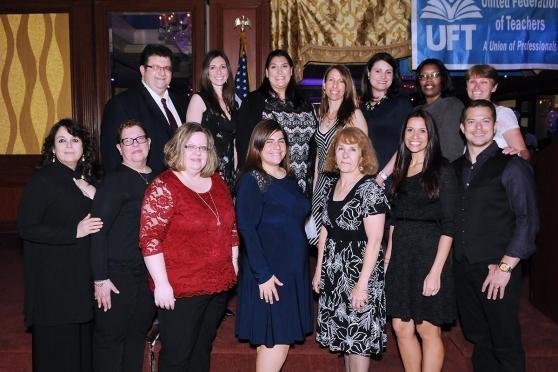 Cirringione-Wright (back row, third from left) is surrounded by her PS 58 collea