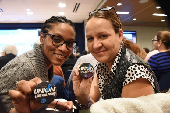 Showing off their Union Loud and Proud buttons at the Delegate Assembly are Aman
