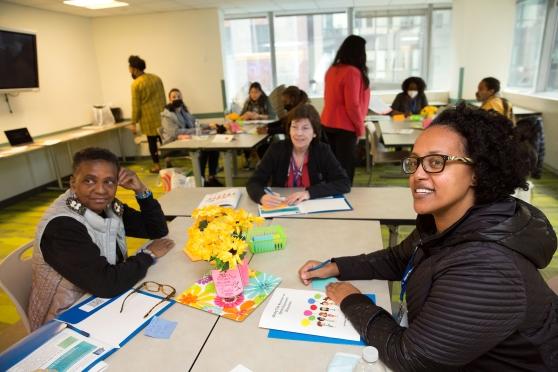 Workshop participants and teachers (from left) Linda Clarke from the Little Sun People Day Care Center, Odalys Alonso from PS 150 in Queens and Kidan Yigzaw from PS 158 in Brooklyn talk about ways to encourage classroom discussion.