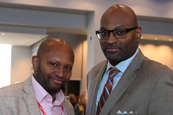 Former UFT Vice President for Career and Technical Education Sterling Roberson (right) received the Retiree of the Year Award during the May 1–2 convening of the Representative Assembly of NYSUT, the UFT’s state affiliate. 