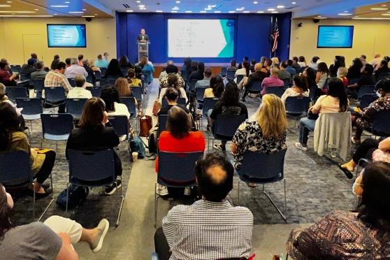 A large group gathered in a room