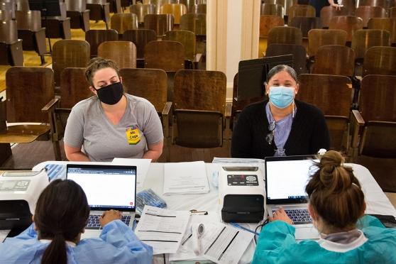 Teacher Catherine Cage (left) and school secretary Brenda Soto at PS 164 in Brooklyn