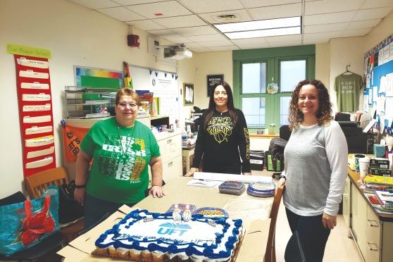 Getting set to bring cupcakes that form a cake to members at PS 92 in Queens are (from left) Chapter Leader Geri Ann Clark, Jessica Weinschreider and Karen Diaz.