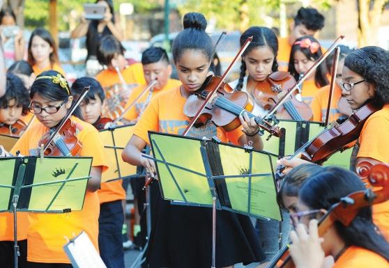 Members of the Corona Youth Music Program perform during the fair.