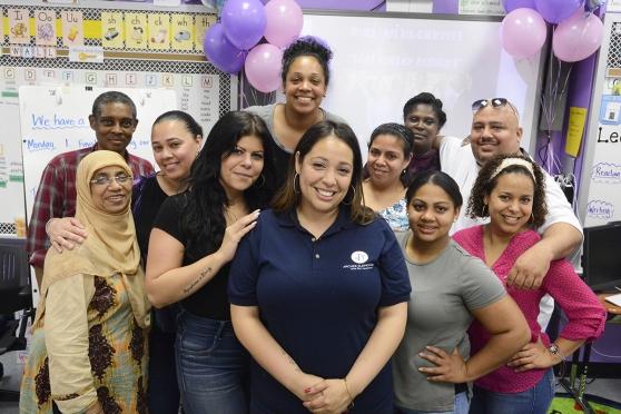 Calderon (center) gets a big thank you from her colleagues at the party.
