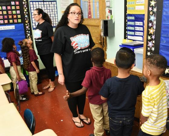 Teachers with students